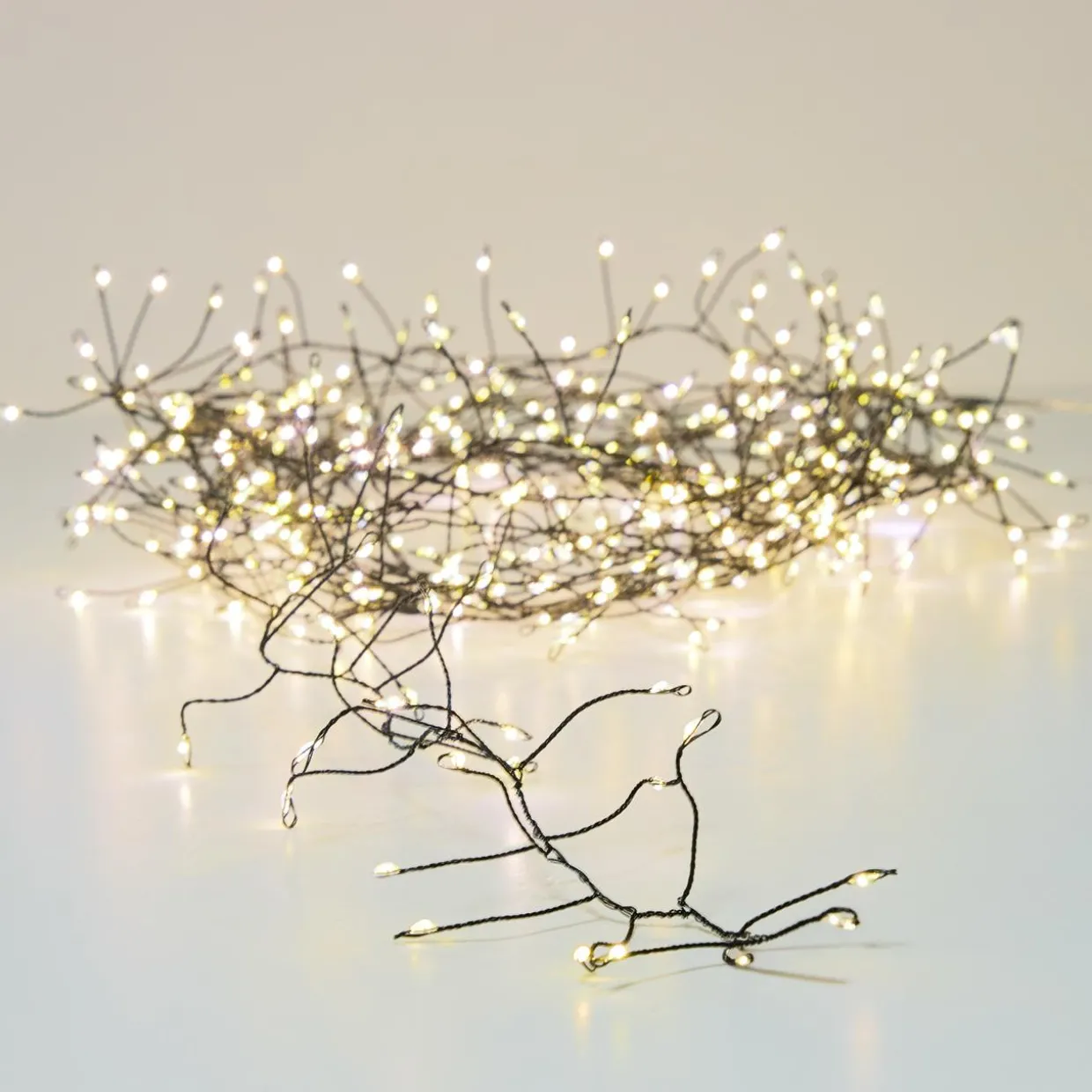 Guirlande lumineuse 18 m 1440 Micro LED câble noir Luxe Blanc chaud